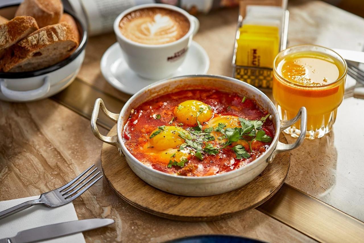 Hotel Indigo Tel Aviv - Diamond District By Ihg Giv'atayim Ngoại thất bức ảnh Shakshuka
